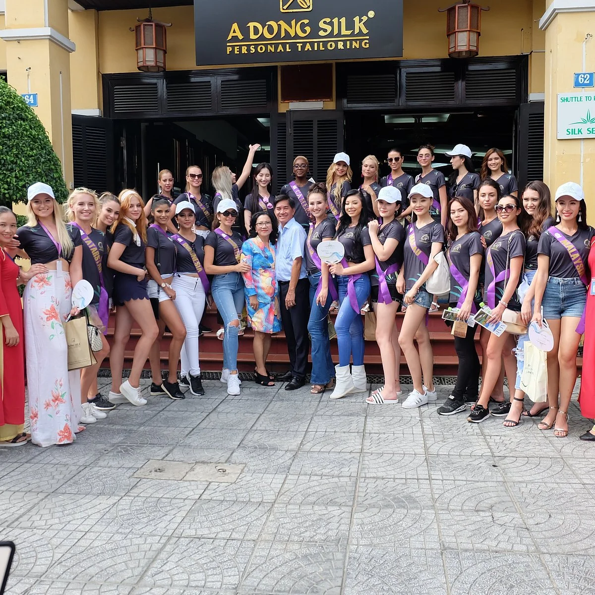 A Dong Silk tailor team working on garments